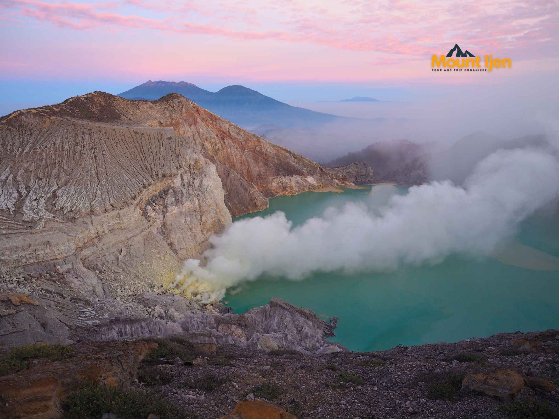 Turquoise acidic crater lake at Kawah Ijen in East Java