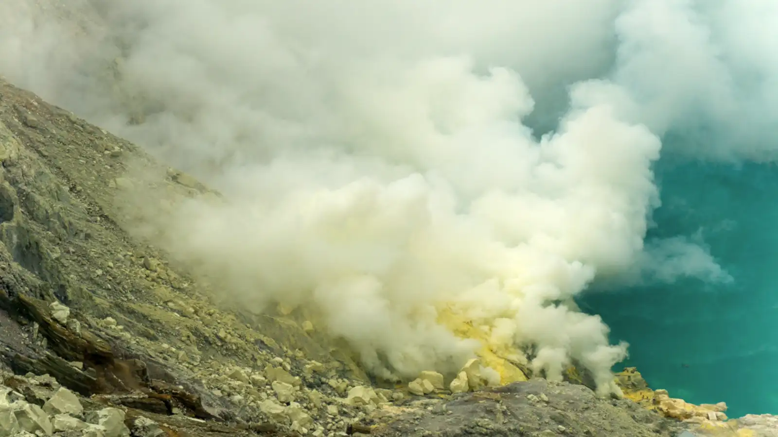 Blue Fire Ijen Crater Electric blue fire glowing in the dark crater of Ijen