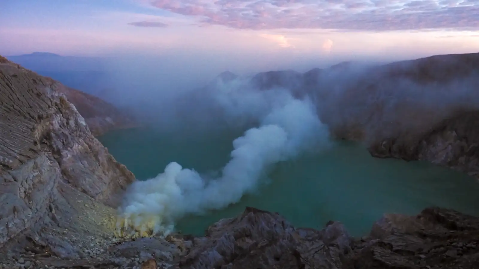 Ijen Crater Blue Fire and Sunrise view from the rim