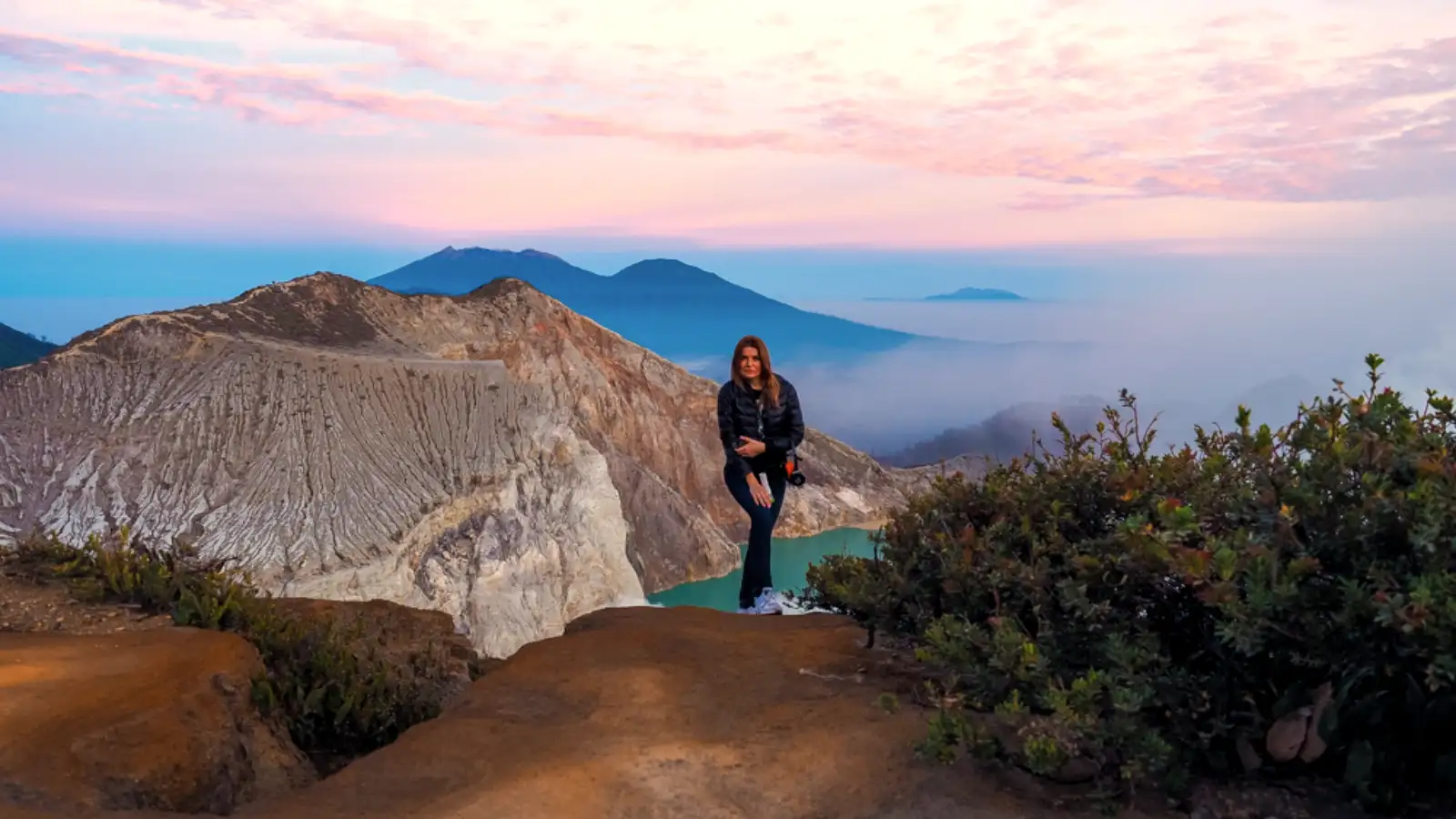 Hikers descending into the crater to witness the Blue Fire phenomenon